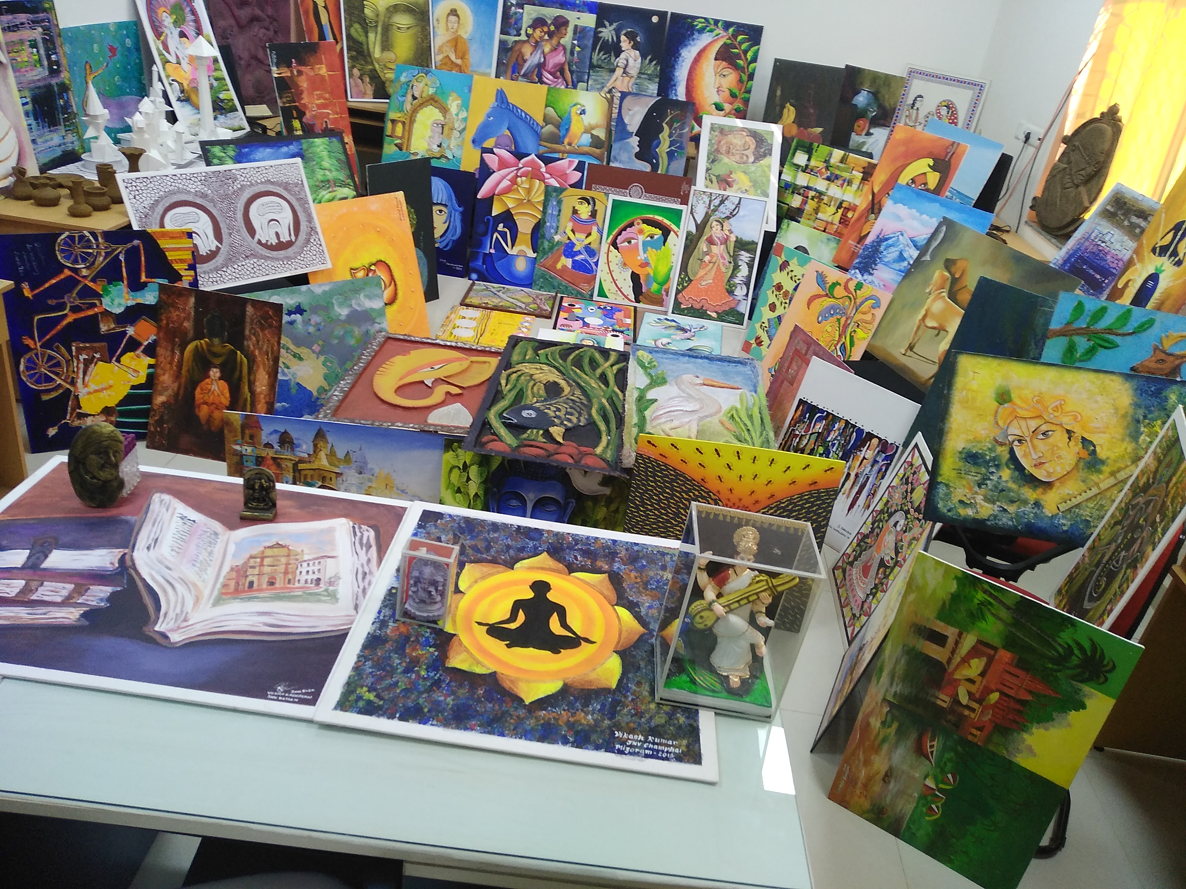 Exbhition of different Painting, Colleagues making , Rangoli  Painting, Paper Sculpture, Clay art etc. prepared  during the training programme of art teachers 